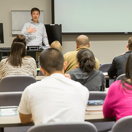 Instructor Teaching in front of class